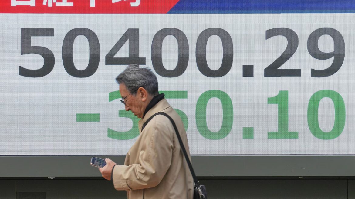 World shares are mostly lower in quiet holiday trading as China stages war drills near Taiwan