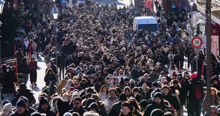 Swiss bar fire victims honoured with silent march by hundreds of mourners – National