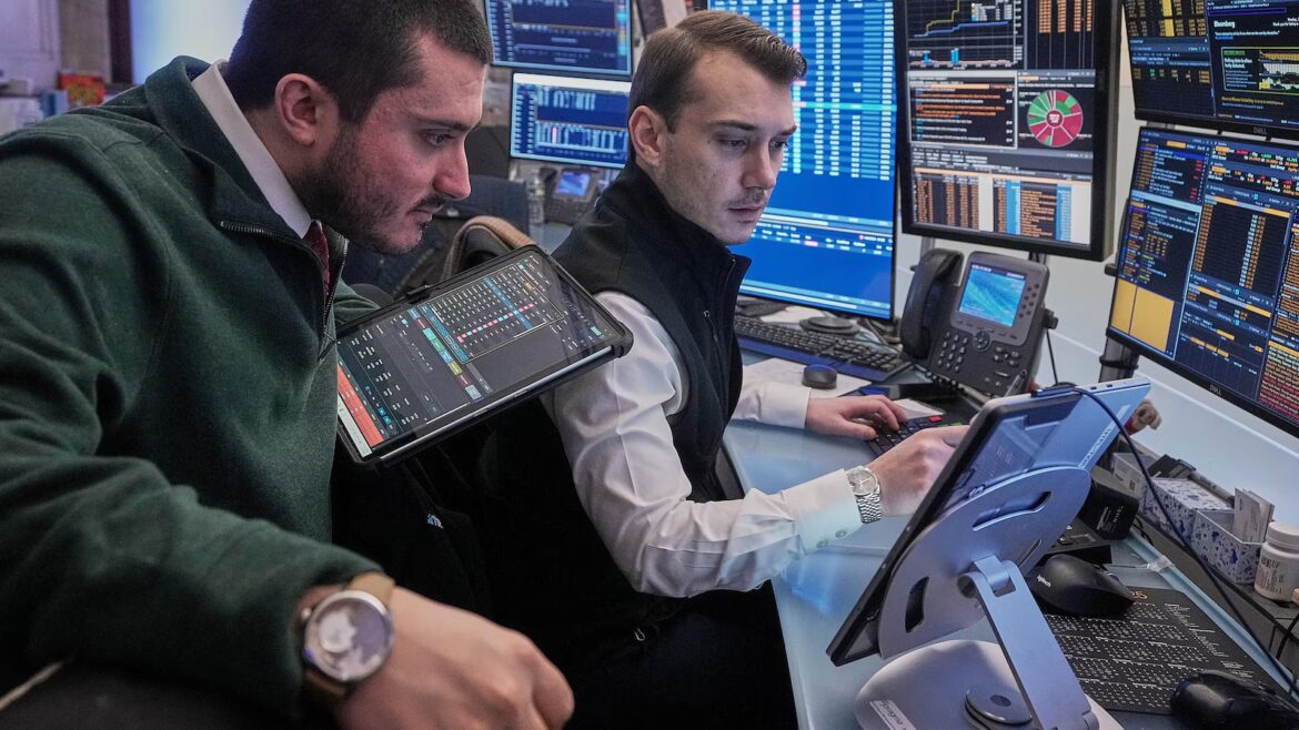 Wall Street opens higher while gold and silver claw back losses