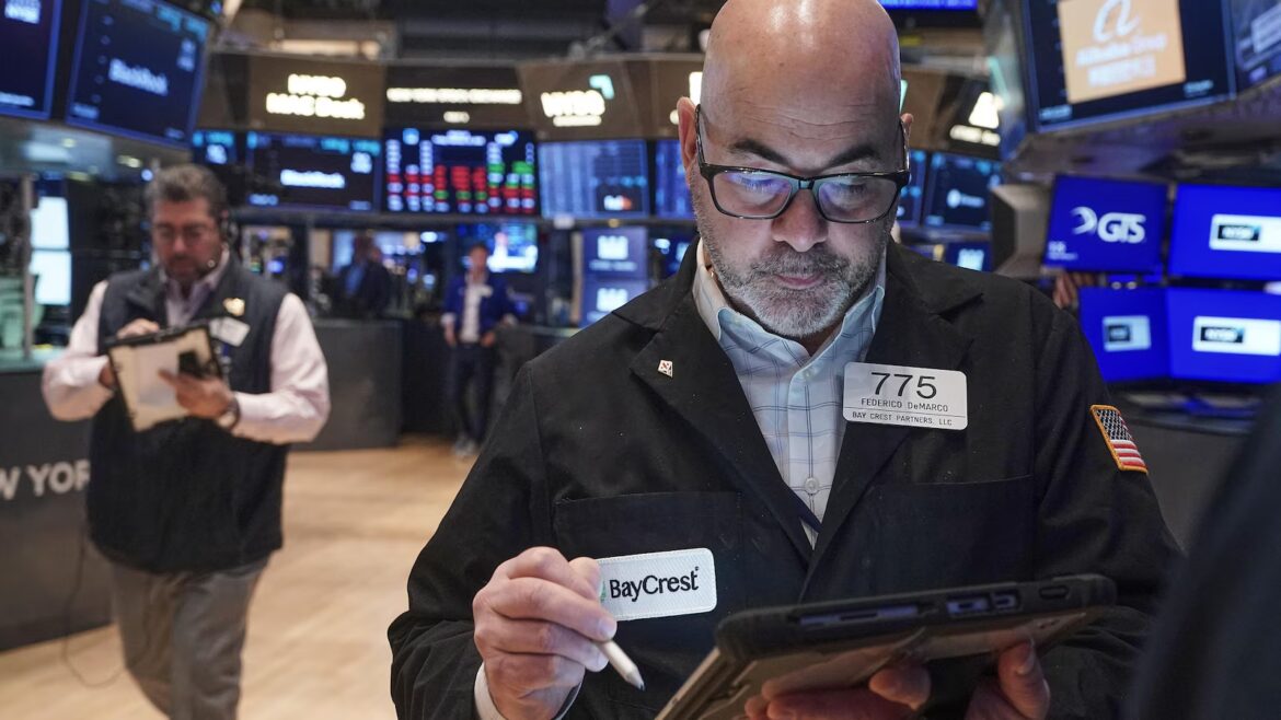 Asian shares trade higher ahead of Lunar New Year holidays and gold prices fall