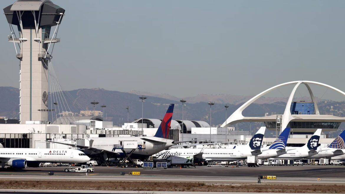 United flight returns to LA airport for an evacuation after a reported fire