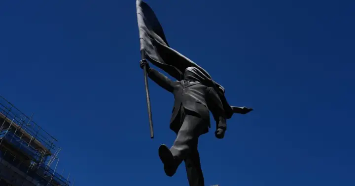 Banksy confirms new central London statue of a man blinded by a flag is his – National